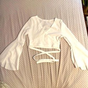 White wrap around bell sleeve shirt